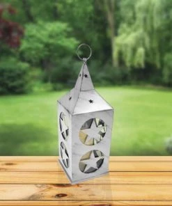 Enchanted Garden™ 17" Metal Cut Out Flameless Candle LED Lantern - Assorted Colors -Enchanted Garden Sale 277 5111 Lifestyle 2
