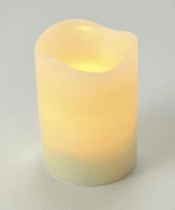Enchanted Garden® 3" X 4" LED Flameless Candle -Enchanted Garden Sale 277 5857 3 x4 IvoryLEDCandle quarter lit
